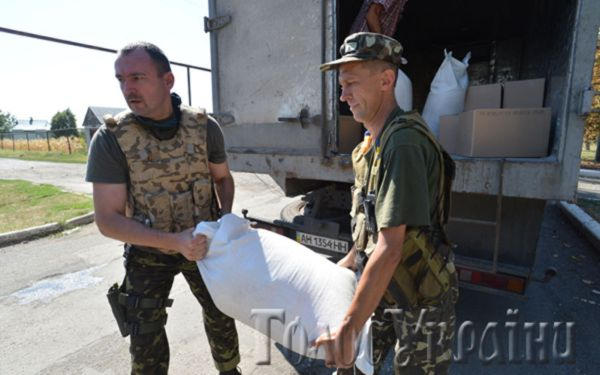 В школы и детсады Марьинского района доставили 10 тонн гуманитарной помощи (фото)