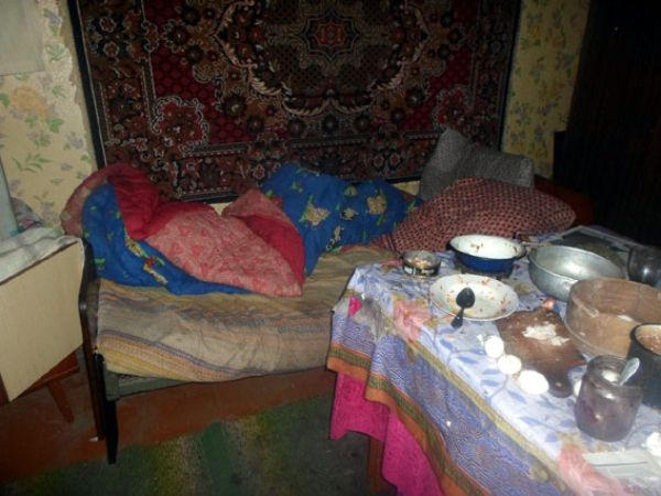 Житель Красногоровки во время приступа ярости зарубил топором своего собутыльника (фото)